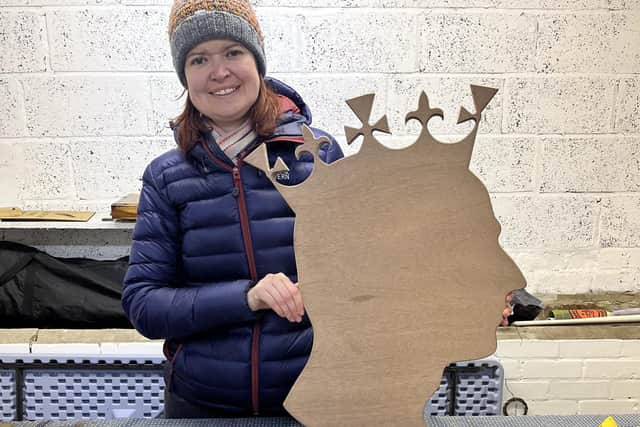 Amanda Bushell with the King's head outline they made for the Coronation.