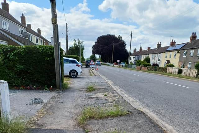 A section of the footpath in Main Road, New Bolingbroke.
