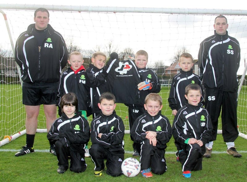 Young footballers from Skegness' East Coast Juniors under eights team are pictured 10 years ago, wearing their new kit, sponsored by J&A International, Spilsby.