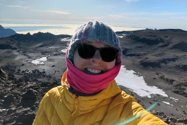 Joanne stops to take a quick selfie on her way to the top.