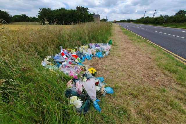 Floral tributes have been laid near the scene of the crash since it happened on Thursday evening.