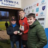 Travis Portas collects his man-of-the-match award.