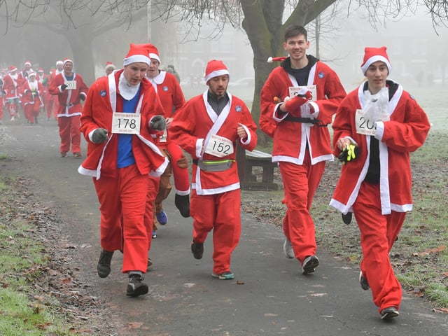 Action from this year's Boston Santa Run.