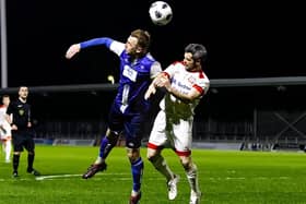 Kallum Smith (right) battles with Lee Beeson during the Lincs Senior Trophy final in April 2024 – photo: (c) Steve Davies