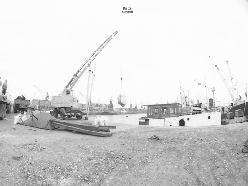 A crane at work in Boston Docks.
