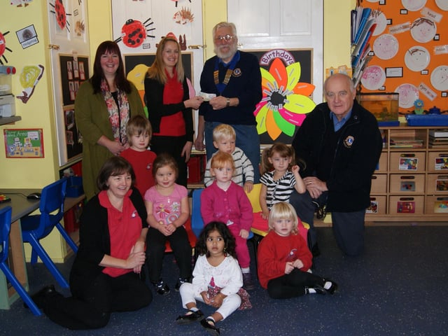 Caistor and District Lions Club donated funds to Rainbow Pre-School 10 years ago to help towards the cost of repairing the heating system. Lions president Reg Hunt is pictured presenting the funds to pre-school manager Jane Carter, alongside Lion Stuart Roach, treasurer Paula Strange, and deputy manager Lou Tinker (front). Pictured children are, standing, Rory Parker and Kayne Delee, seated (from left) Summer Ford, Emeline Myshrall and Jasmine Storrl and, front, Raadhhaa Meher and Lola Chappell.