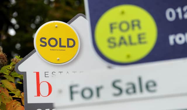File photo dated 14/10/14 of sold and for sale signs. A scramble by buyers to complete before the stamp duty holiday started winding down pushed UK house prices to a record high in June, official figures show. House prices rose by 13.2% over the year to June, faster than at any point since November 2004, according to the Office for National Statistics (ONS). Issue date: Wednesday August 18, 2021.