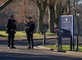 Police officers stand guard inside Epsom College after the school's head, Emma Pattison, was found dead alongside her family  on February 6, 2023 in Epsom. Pattison, her husband George, and 7-year-old daughter Emma were found dead in a property on school grounds early on Sunday morning. (Photo by Carl Court/Getty Images)