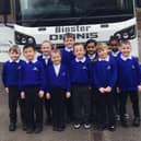 Pupils of Benjamin Adlard School in Gainsborough with their winning lorry name, Binster