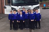 Pupils of Benjamin Adlard School in Gainsborough with their winning lorry name, Binster