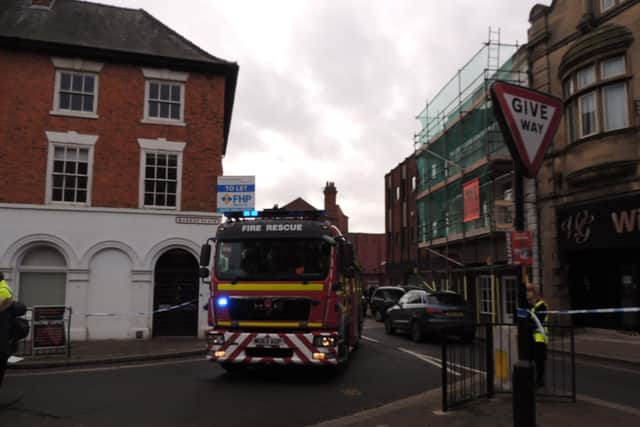 A fire crew was on hand to assess the safety of the damaged scaffolding.