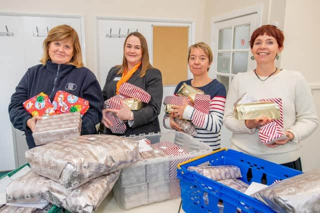 Lincolnshire Co-op colleagues with Children’s Links volunteers (from left to right: Karen Holland, Community Co-ordinator, Ann Smith, Assistant Manager at Louth Travel, Sarah Buik and Vic Holt, both Trustees at Children’s Links).