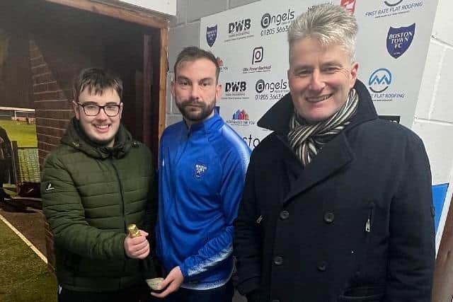 Man of the match Jason Field with sponsors Tom and Glen Carter.