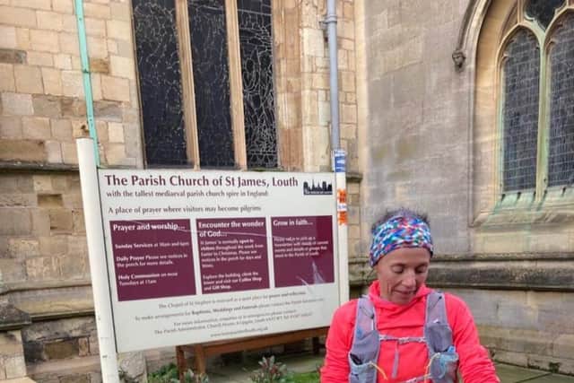 Emma arrives back at St James Church at the end of the Silver Lincs Way.