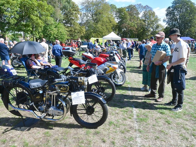 Casting an approving eye over the motorcycle entries.