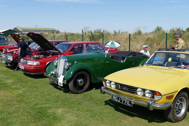 A display of classic cars at the anniversary event.