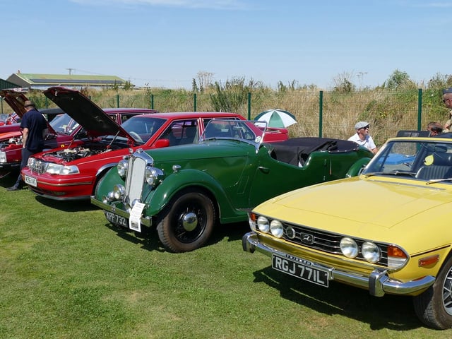 A display of classic cars at the anniversary event.