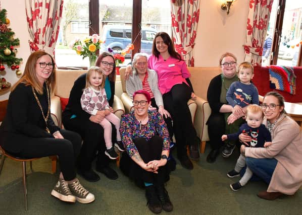 The Mayor of Coningsby, Amanda Bowen, pictured left with staff and residents of Toray Pines and children from Little Acorns Day Nursery. Photos: Mick Fox