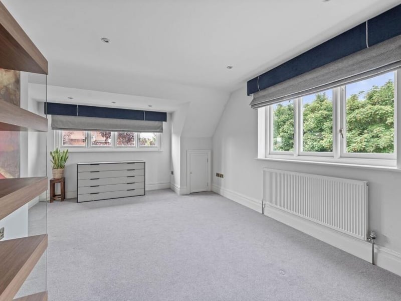 A third first-floor bedroom and ...