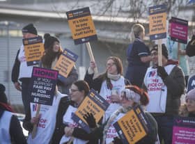 A Royal College of Nursing picket line as staff strike outside a hospital.