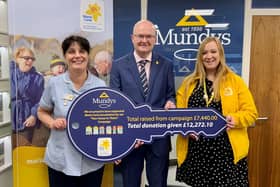 One of the Marie Curie Nurses and Lauren Alexander, Marie Curie Community Fundraiser, with Simon Bentley, Senior Partner at Mundys