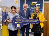 One of the Marie Curie Nurses and Lauren Alexander, Marie Curie Community Fundraiser, with Simon Bentley, Senior Partner at Mundys