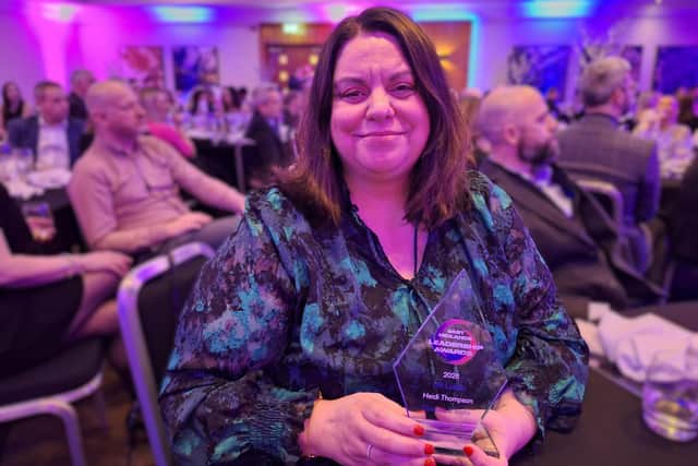Proud Heidi Thompson, chief people officer at Duncan & Toplis, with her leadership award.