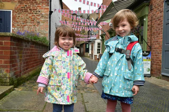 Jasmine Kemble 4 and Poppy Kemble 2 in Pawnshop Passage, Louth enjoying the festivities.