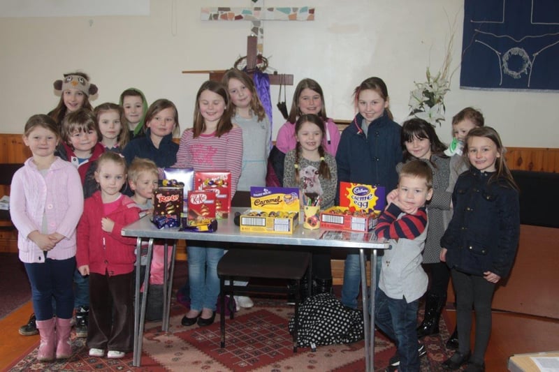 Here we see youngsters taking part in an Easter egg hunt at Burgh Baptist Church.