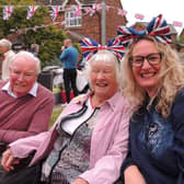 Having a right Royal knees up at the street party in Cobblers Way, Sleaford, from left - Mike Bates, Joan Windever and Babs Thomson.