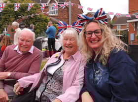 Having a right Royal knees up at the street party in Cobblers Way, Sleaford, from left - Mike Bates, Joan Windever and Babs Thomson.