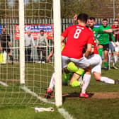 Player-manager Tom Ward (third from right) scores Sleaford's second at Kimberley. Photo: Steve W Davies Photography.