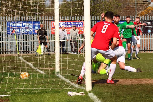 Player-manager Tom Ward (third from right) scores Sleaford's second at Kimberley. Photo: Steve W Davies Photography.