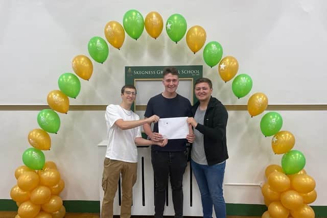 The wait is over at Skegness Grammar School - Beck Squires, Jamie Scott and Luke Enderby.