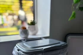 Indoor food waste caddy shown with a liner in place — perfect for collecting kitchen scraps cleanly and conveniently before transferring to the outdoor bin.