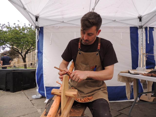 Ian Sturgess, of Boston Bows, carving a longbow.