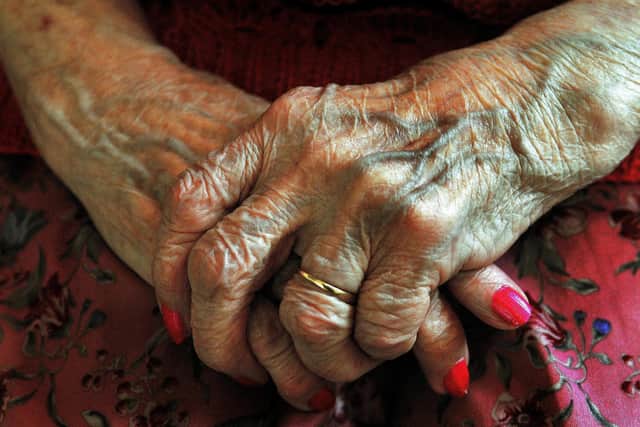 File photo dated 05/12/08 of the hands of a resident at a nursing home as the Government is 'woefully underprepared' for the consequences of a rapidly ageing society in England, a House of Lords committee warned.
