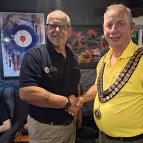 National president Kelly Clark (in yellow) and Horncastle 41 Club chairman Gary Fisher.