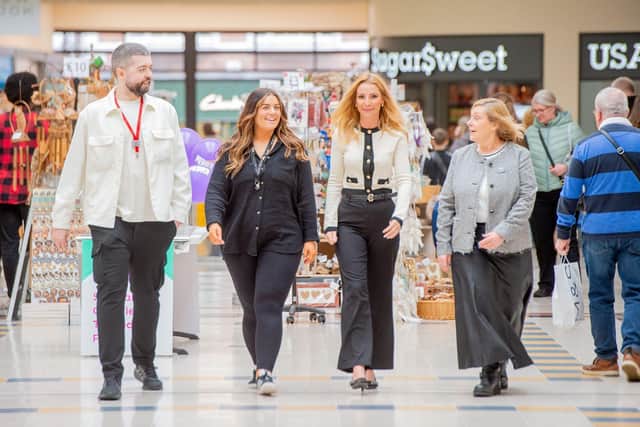 From left, H&M Manager James Fletcher, The Body Shop Manager Jess Deaton, Centre Manager Mary-Jane Booth, and Next Manager Helga Corby walk through Lincoln’s Waterside centre. All three stores have committed to remaining part of the centre for years to come.