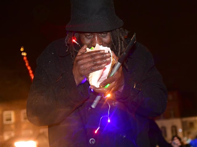 A participant in the Illuminate Parade