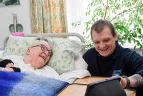 Gainsborough resident Veronica Eden learns from care technology consultant Dan Clarke how to get the best out of her new system