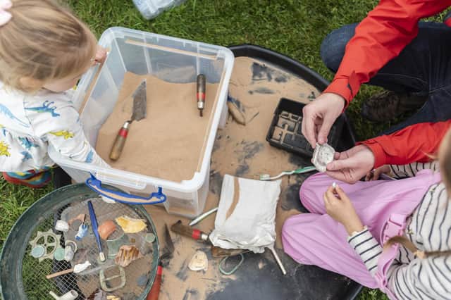 Children enjoying an archaeological activity during the Festival of Archaeology 2023. ©National Trust Images/Paul Harris