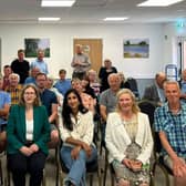 Dr Caroline Johnson and Shadow Cabinet minister Claire Coutinho with residents at the solar farm event at Thorpe on the Hill village hall.