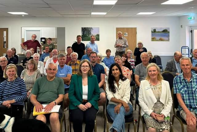 Dr Caroline Johnson and Shadow Cabinet minister Claire Coutinho with residents at the solar farm event at Thorpe on the Hill village hall.