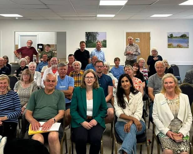 Dr Caroline Johnson and Shadow Cabinet minister Claire Coutinho with residents at the solar farm event at Thorpe on the Hill village hall.