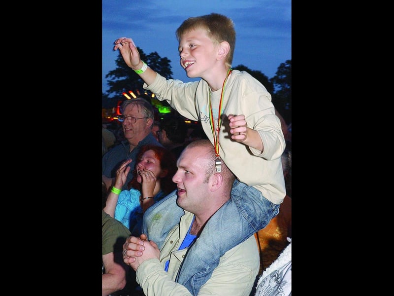 A youngster enjoys an elevated view.