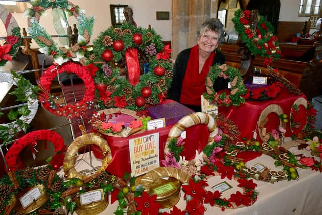 Ann Garrill of Sleaford with her Christmas Wreaths at Crafts By Candlelight.