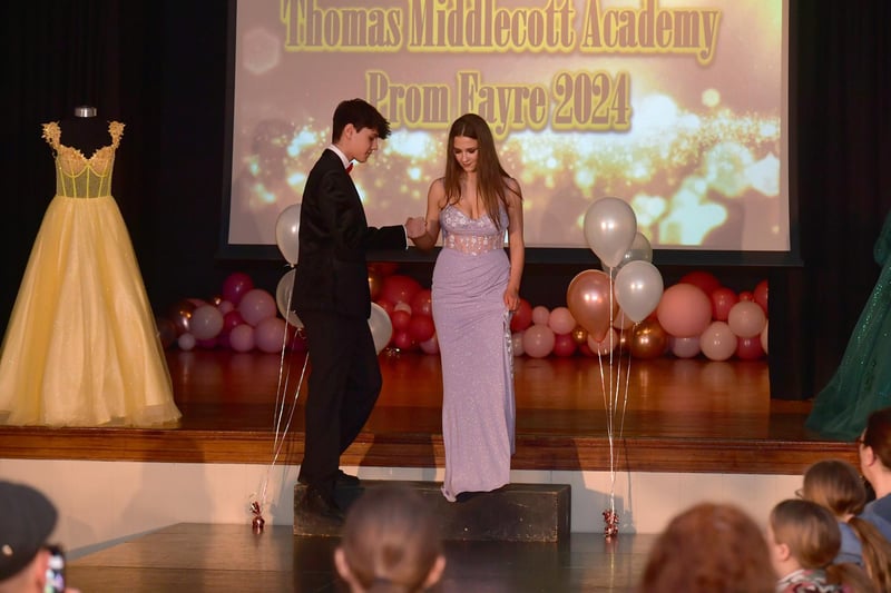 Cautiously stepping onto the catwalk.