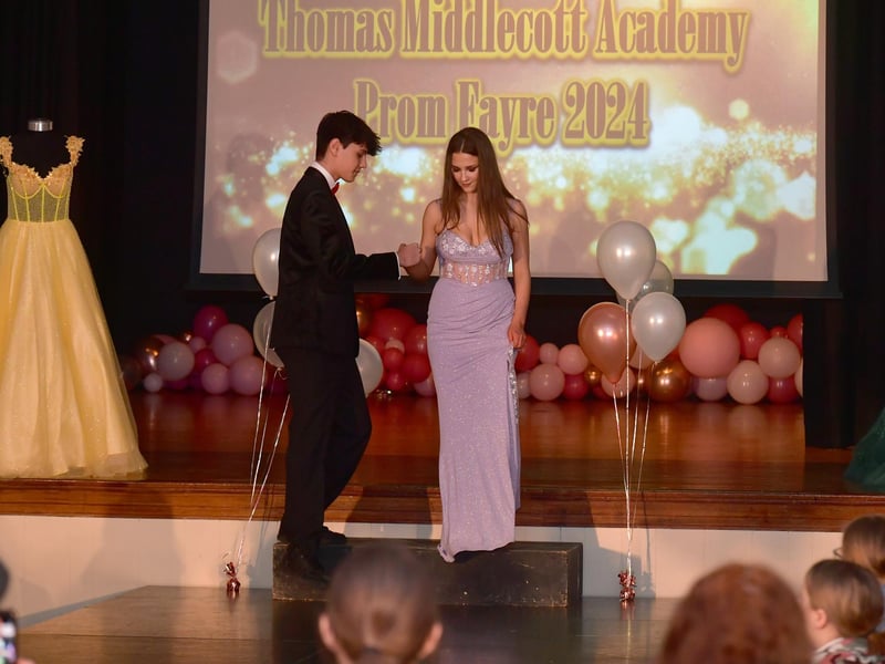 Cautiously stepping onto the catwalk.