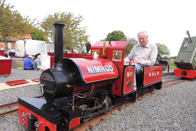 Robert Holland with his favourite steam locomtive on the Ropsley Heath Light Railway.